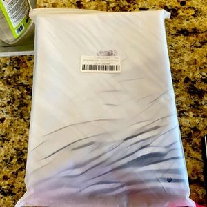 Sloth shower curtain with rings